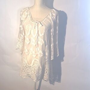 Exquisite embroidered accents and floral crochet lace and mesh blouse by XOVI